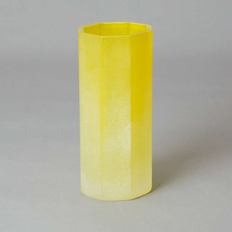 Circa 1970s lemon yellow scavo-style vase in octagonal form by Murano glass manufacturer Cenedese. Original label affixed to bottom.