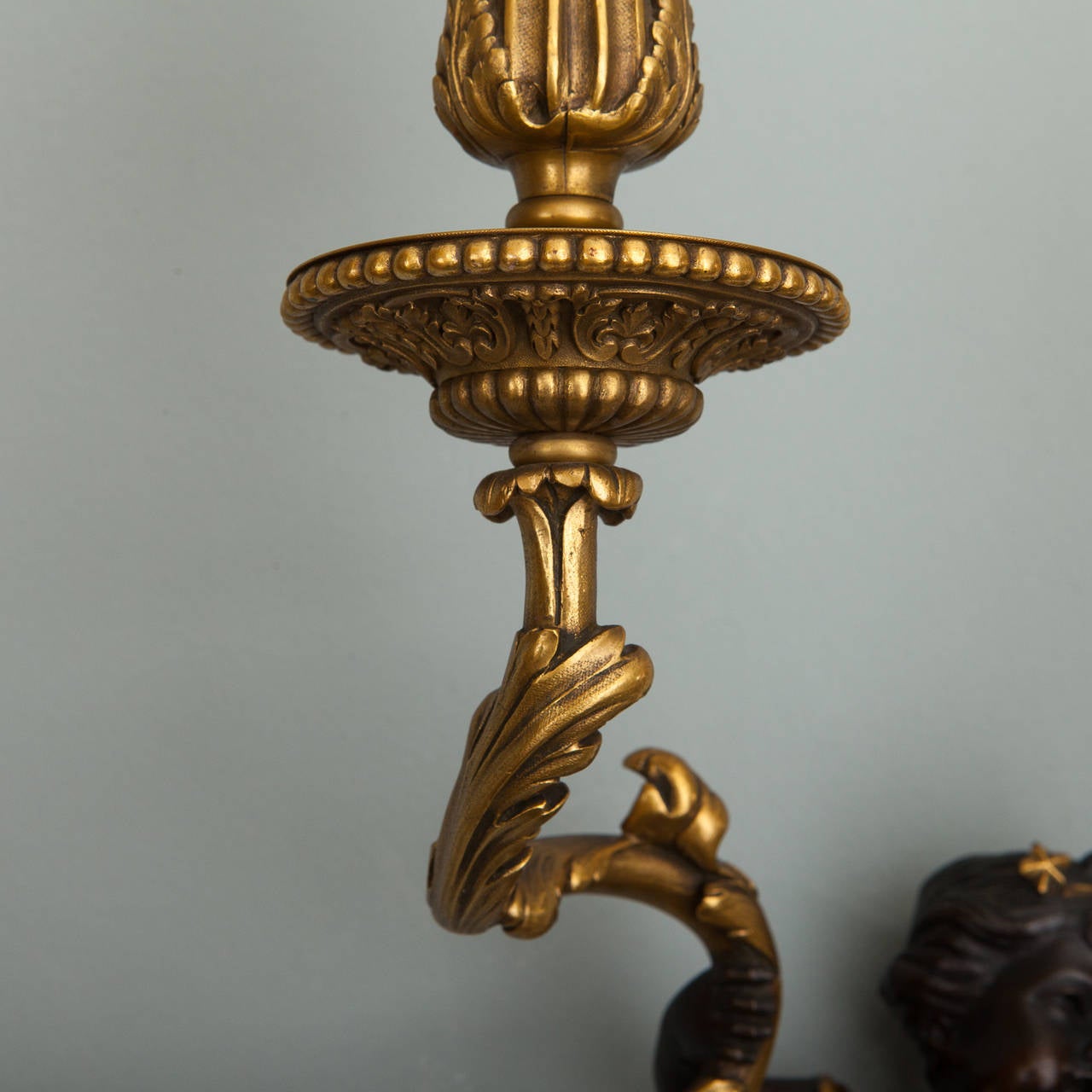 Gilt Pair of Two-Arm Gilded Bronze Sconces with Puti