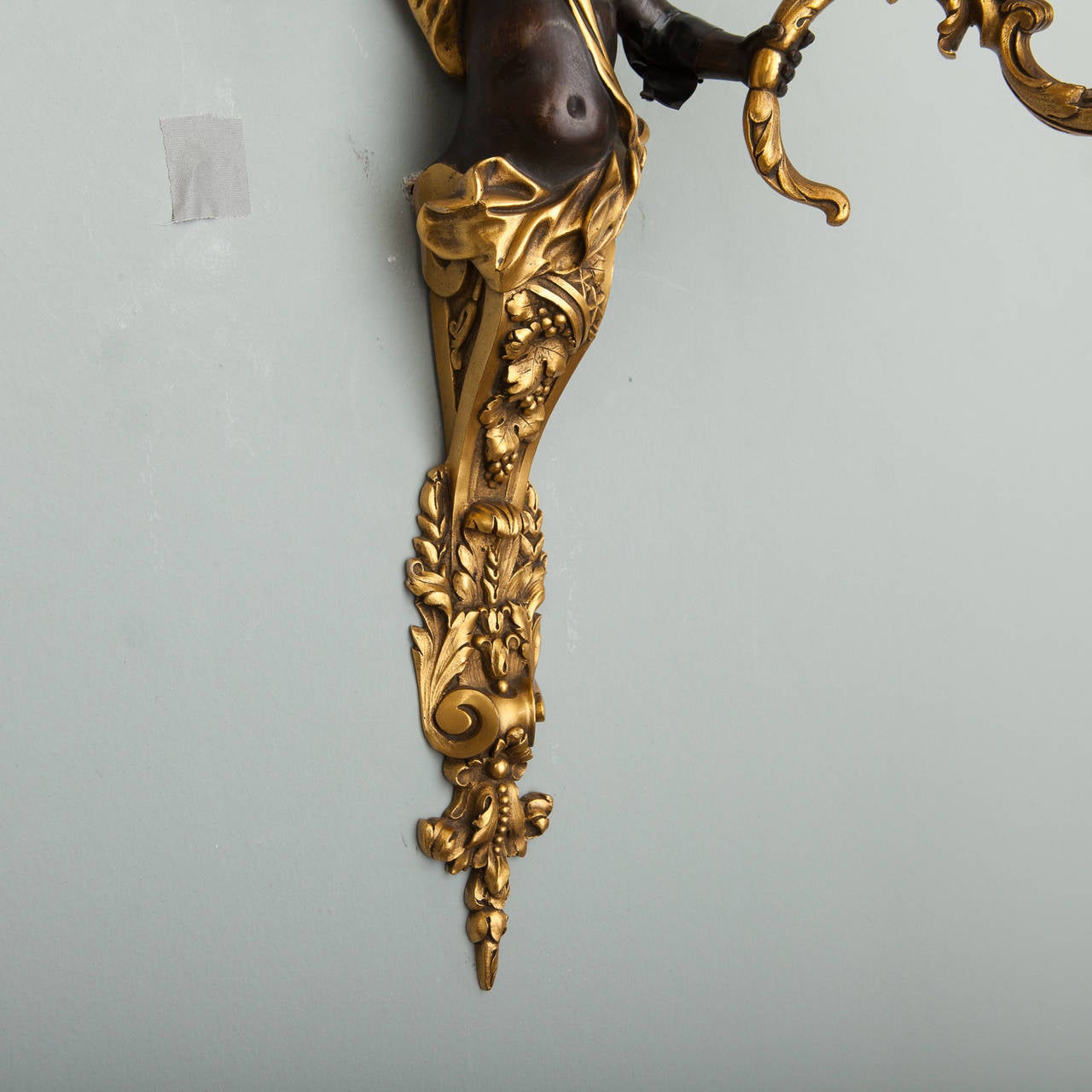 Early 20th Century Pair of Two-Arm Gilded Bronze Sconces with Puti