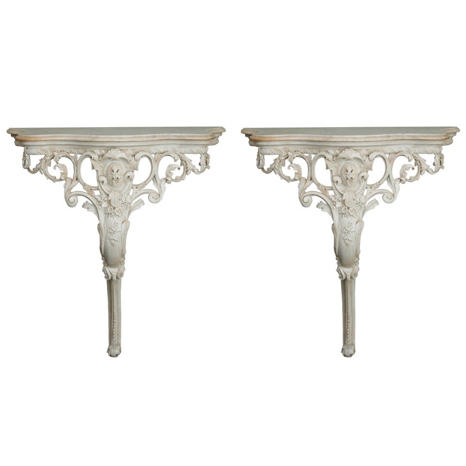 Pair French Wall-Mounted Highly Carved Consoles with Marble Tops