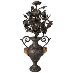 Antique 19th Century French Iron Urn with Flowers and Putti Faces