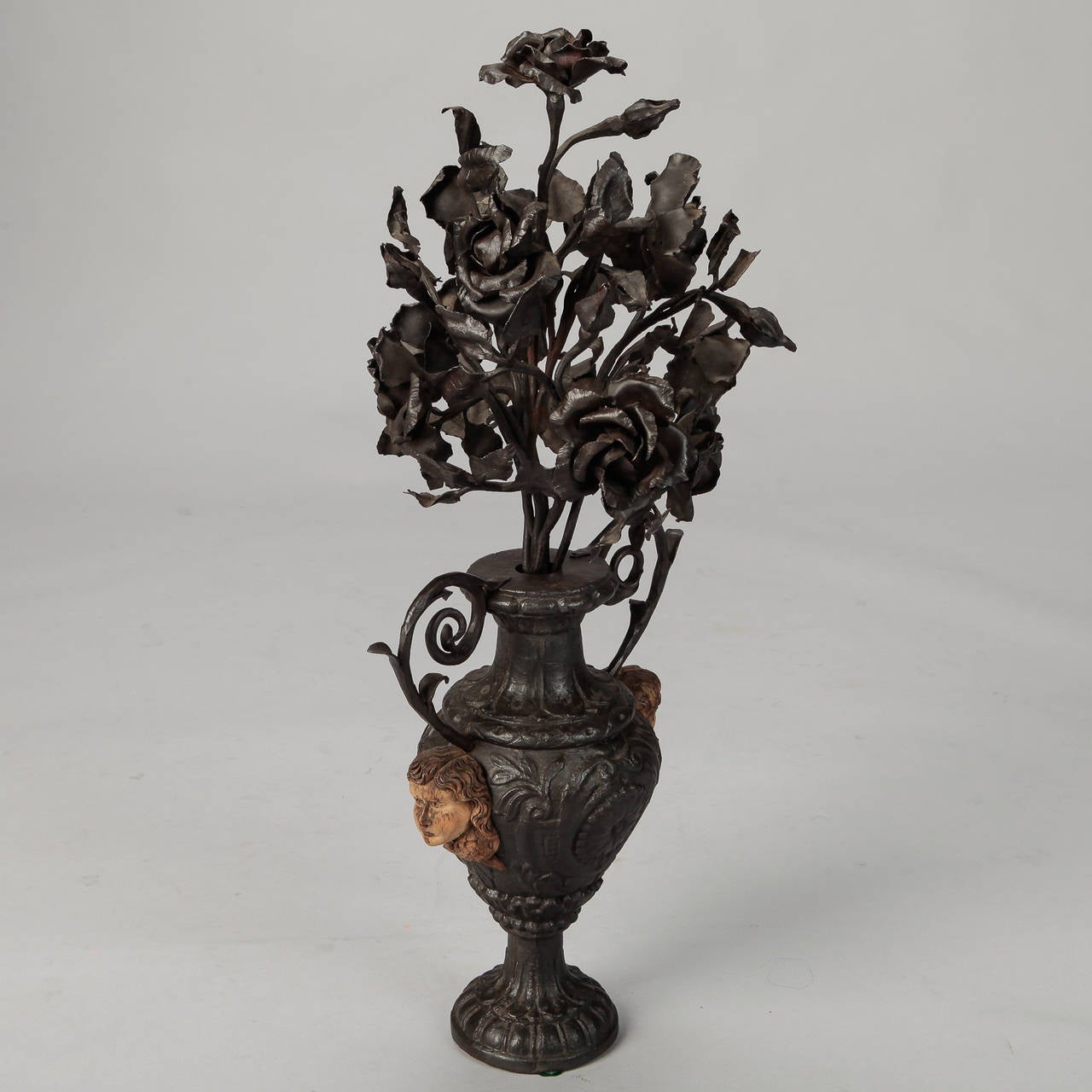 19th Century French Iron Urn with Flowers and Putti Faces 3