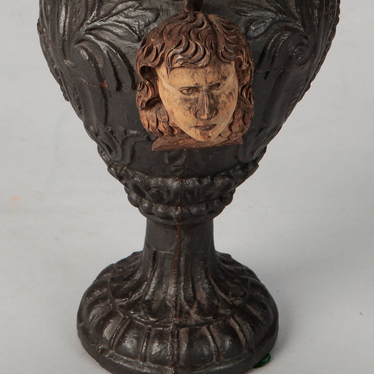 19th Century French Iron Urn with Flowers and Putti Faces 2