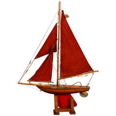 English Pond Boat With Red Sails and Rudder