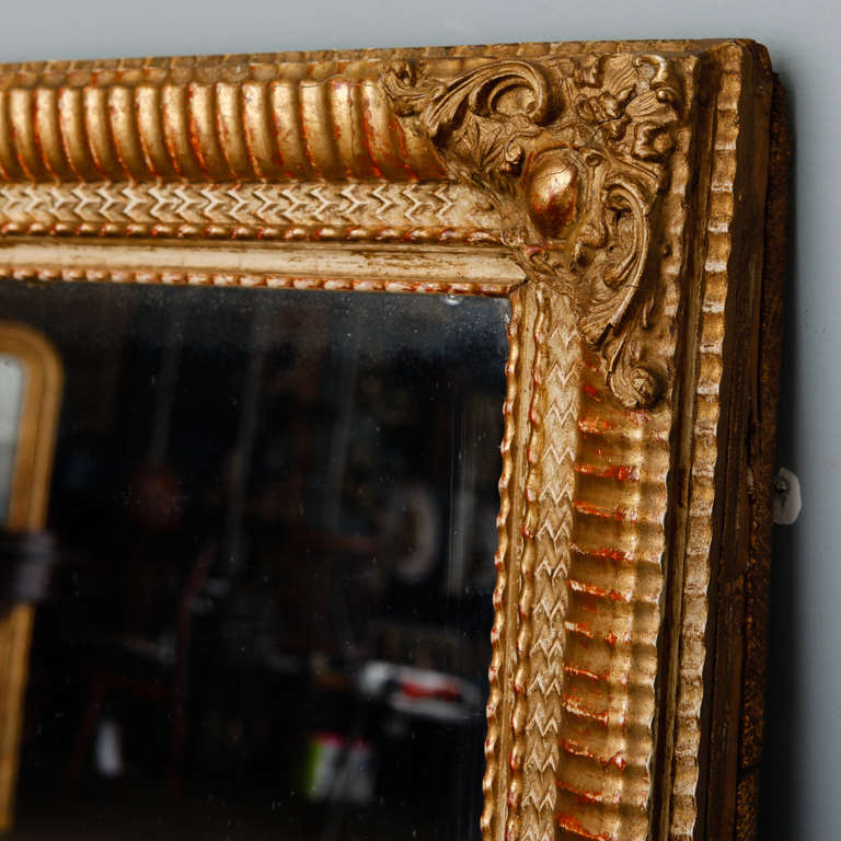 French 19th Century Louis Philippe Ribbed Giltwood Mirror with Cartouche Corners