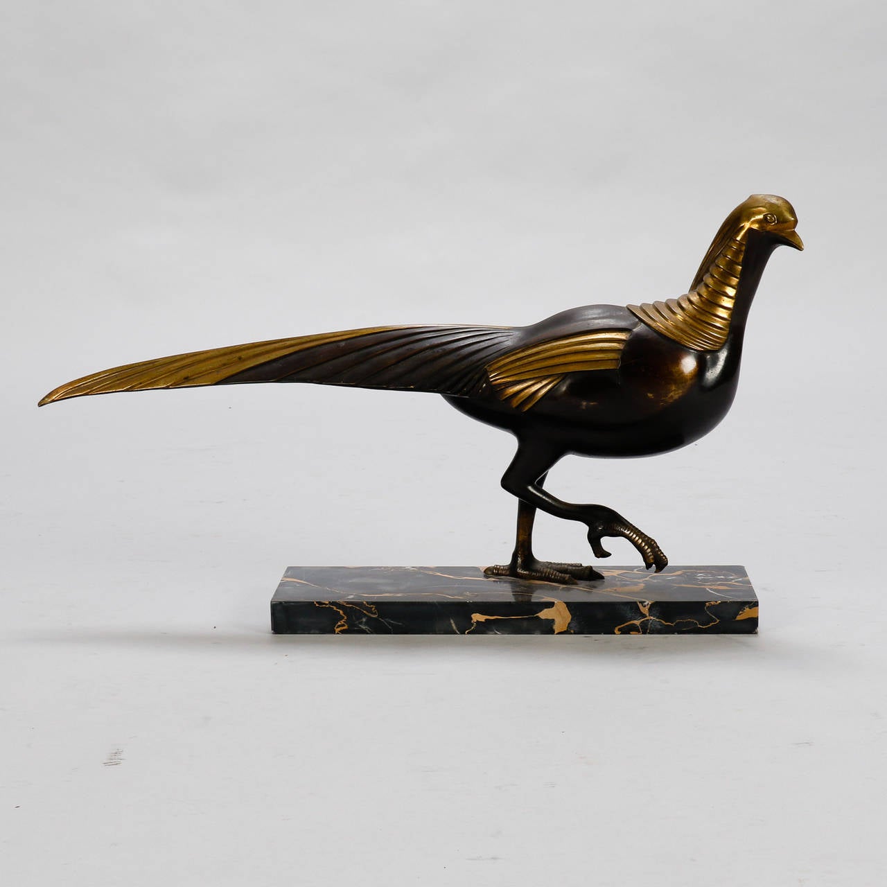 European bronze sculpture with gilded details signed M Lucas mounted on a marble base, circa 1930s.