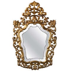Elaborately Reticulated and Crowned French Gilt Wood Mirror