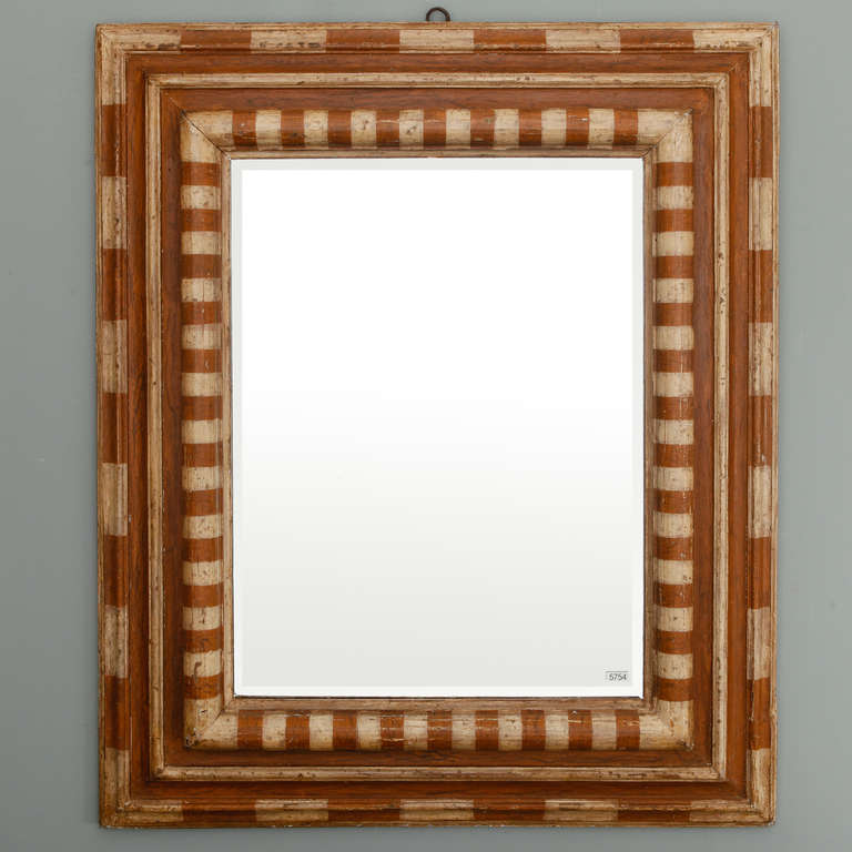 Circa 1920s deep set Italian frame with a brown and cream painted stripe finish. New mirror, old frame. If using the hanging ring as shown, add 1