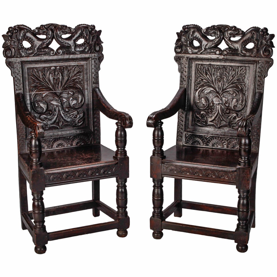 Pair of 19th Century English Dark Oak Carved Dragon Armchairs