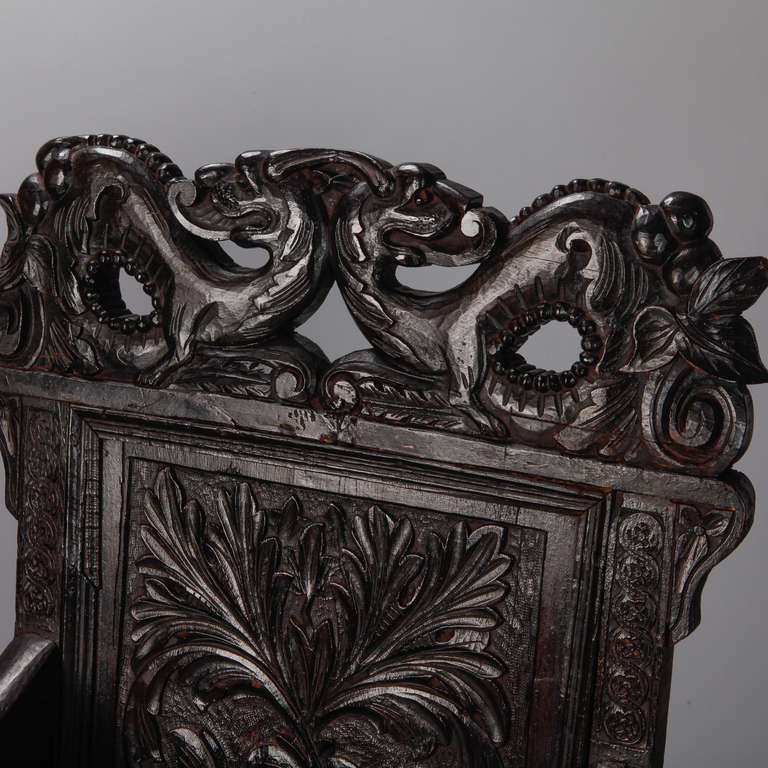 Pair of 19th Century English Dark Oak Carved Dragon Armchairs
