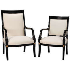 Pair of His and Hers Ebonized Empire Style Dolphin Chairs with Brass Mounts