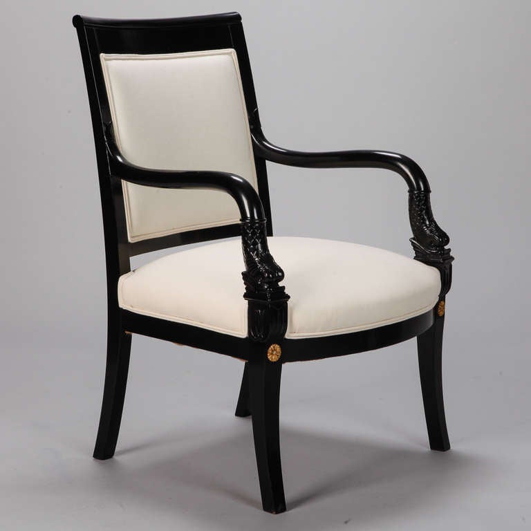 Pair of His and Hers Ebonized Empire Style Dolphin Chairs with Brass Mounts 1