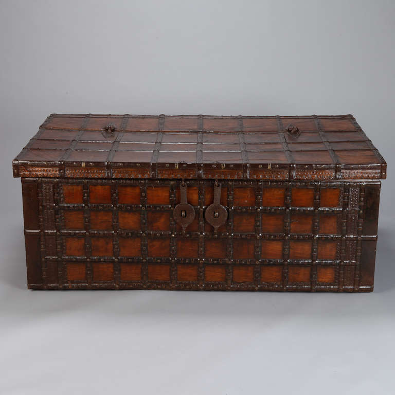 Extra large English iron bound wooden trunk dates from 1850s. Beautiful, sturdy piece that can be used for storage or as a table.