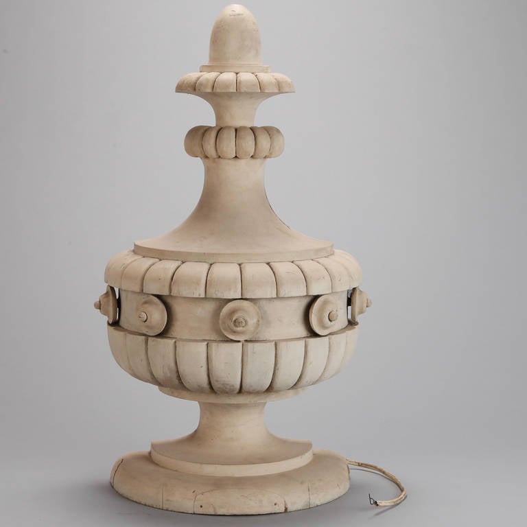 Tall bleached wood decorative architectural element in form of urn with a flat back, circa 1900s. Great carved textural and decorative details. The flat back means this piece can be hung or displayed against a wall. Currently wired with a light