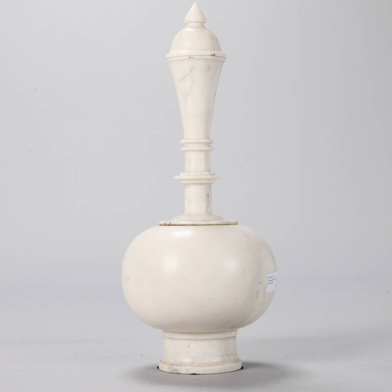 Circa 1900 tall turned marble vessel in classic Mogul style. This piece is two feet tall with lid.