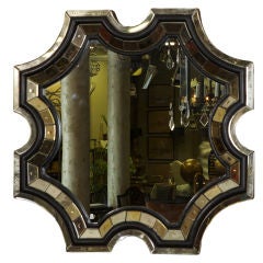 Black Framed Scalloped Mirror with Antique Elements