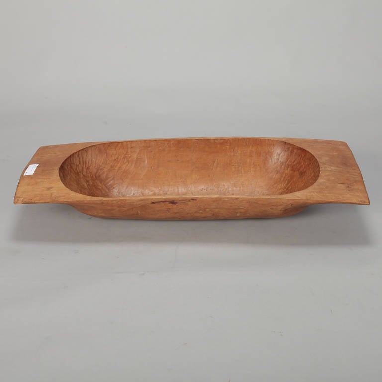 Circa 1880s large hand cut wood bread bowl found in France. These types of traditional handmade bowls were used for morning bread dough during the rising process, but now works beautifully for decorative storage or display purposes. We have other
