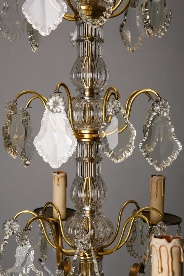 20th Century French Eight Light Brass and Crystal Chandelier