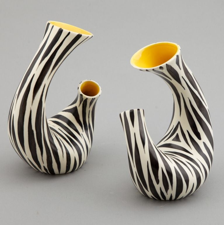 This series designed by Albert Hallam for Beswick created quite a stir in the 1950s. This organic shaped, double necked vase is one of the more unusual shapes. Zebra stripe exterior glaze with bright yellow interior. Sold and priced as a pair. We