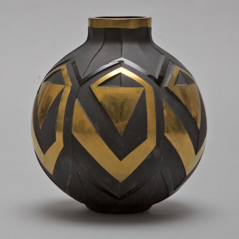 French black matte glass vase with contrasting geometric pattern of polished glass and gold.