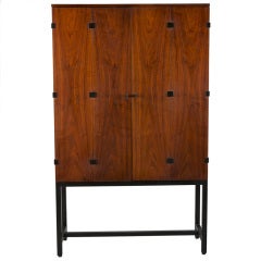 Mid Century Tall Walnut cabinet by Kipp Stewart for Directional