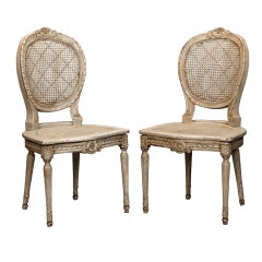 Six French Painted and Caned Oval Back Chairs