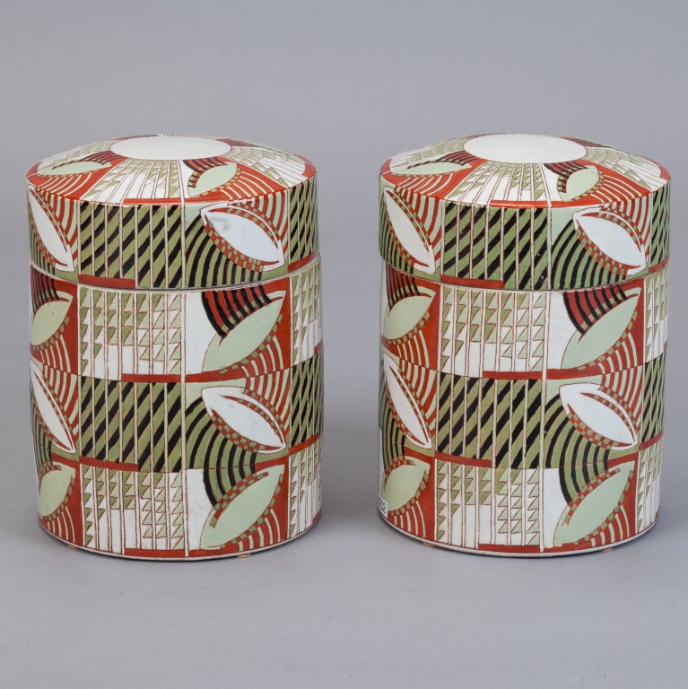 Unusual pair of mid-century lidded ceramic jars / canisters have a striking Japanese-style graphic design in shades of rust, white, and green.  No flaws found.