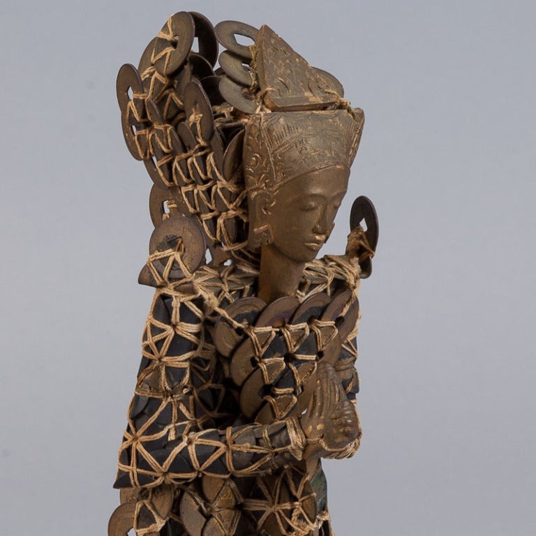 Carved Balinese Kepeng Coin Statue