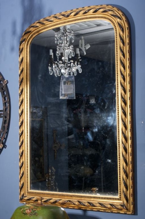 French Louis Philippe Gilt and Ebonized Mirror For Sale