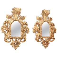 Ornately Carved Pair of 18th Century Florentine Giltwood Mirrors