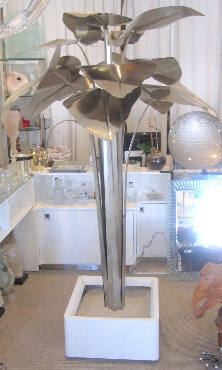 A Very Unique Nickel Plated Metal Palm Tree Sculpture in White Lacquered Planter Box filled with Sand.