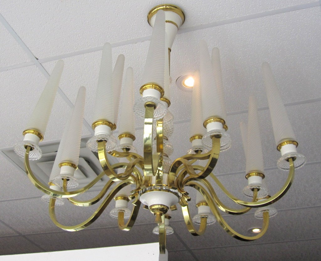 Astounding Chandelier of Tulip Glass and Brass in the Style of Leleu, Arbus, and Poillerat. This 17 Armed Chandelier is in Excellent Condition and Rewired for the USA.