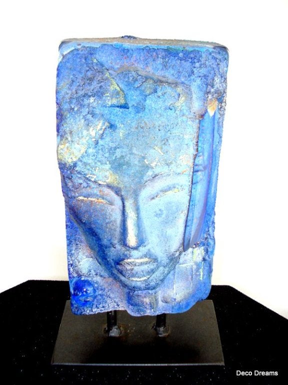 This beautiful totum, was created by Bjorn Ekegren. He uses a sand casting technique similar to the one used by the Egyptians 2000 years ago. Deeply inspired by the Mediterranean, Bjorn uses turquoise, blue colors. His sculptures often carry the