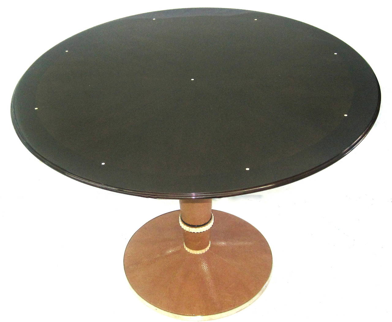 A Unique French Art Deco Table by Saddier in Exotic Wood, Mother of Pearl Inlay, Shagreen Base Adorned with Bakelite, and Nickeled Metal Trim to Complete the Refined Elegance of this One-of-a-Kind Piece.