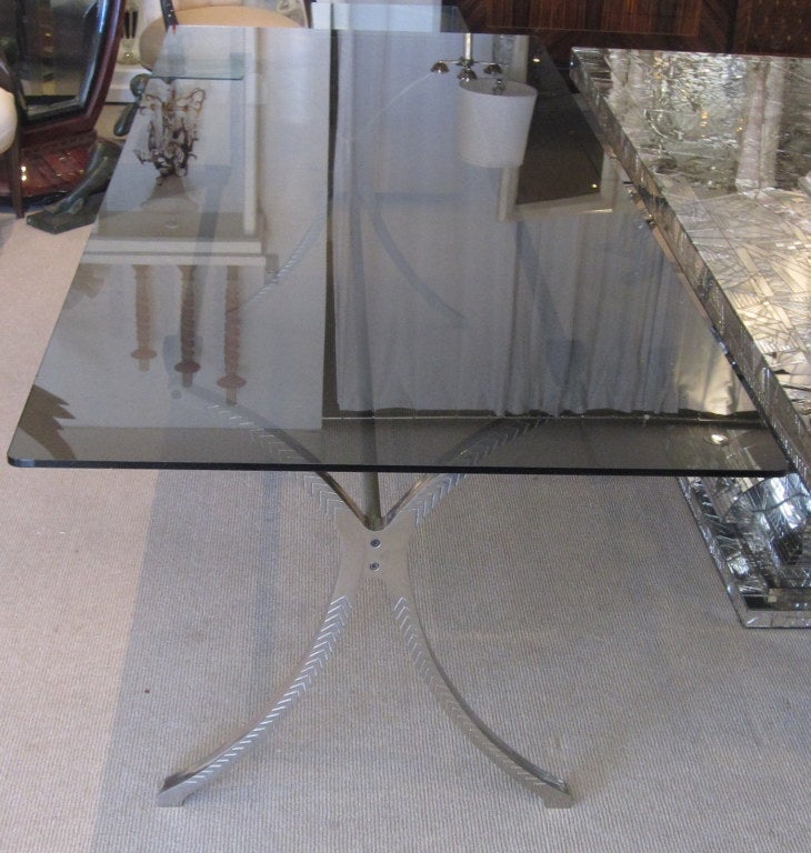 Gorgeous Hand Hammered Nickeled Metal Work Create a very Pure Table Base for the Smoked Glass Table Top. A Very Industrial  French Modernist Example of High Quality Craftsmanship.