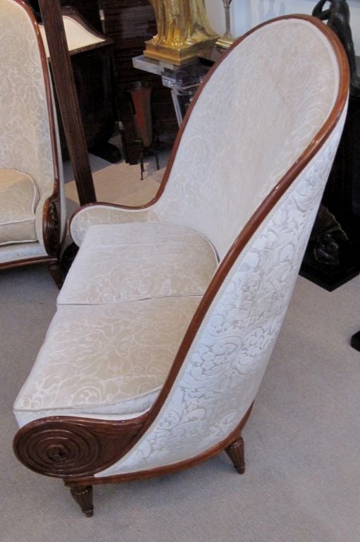Gorgeous French High Backed Salon Set, in the Style of Paul Iribe. The Rosewood is Beautifully Carved and this Stunning Three Piece Set is Upholstered in an Ivory Silk Velvet Brocade.<br />
2 Place Sofa Measures:  47