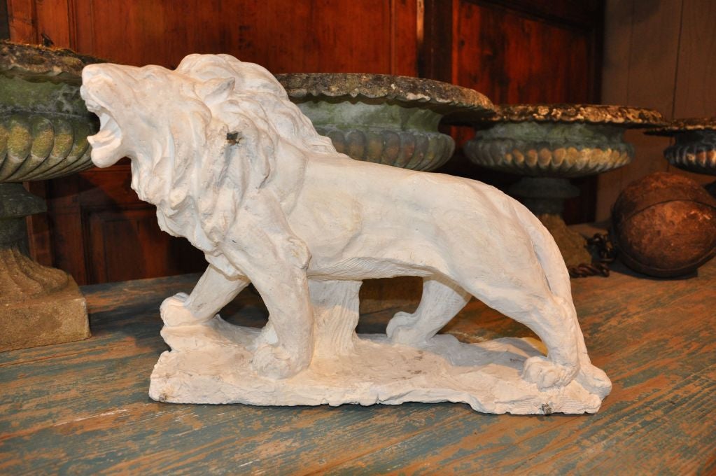 A FRENCH NINETEENTH CENTURY PLASTER LION