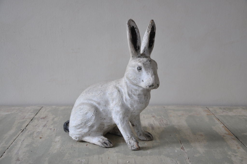 A FRENCH NINETEENTH CENTURY RECONSTITUTED STONE RABBIT