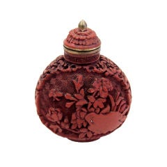 Antique Cinnebar Snuff Bottle from China. Signed