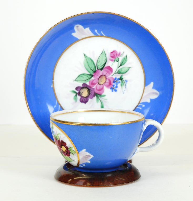 A hand painted Porcelain Cup & saucer from the celebrated Gardner factory at Werbiliki near Moscow.  The factory was established in 1765 by an Englishman Francis Gardner and became, after the Imperial factory, the second biggest in Russia.  This