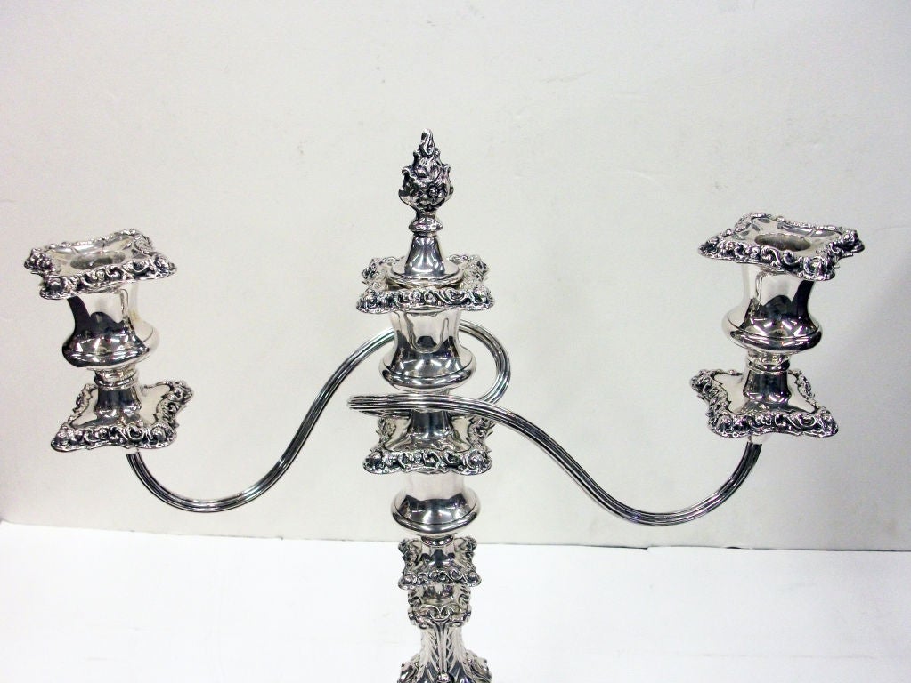A pair of ornate Silverplated three light Candelabra with removable bobeches.  Regency Plate design made for Birks, Canada in England.