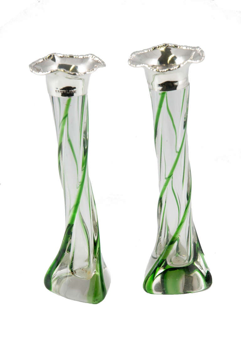 A most pretty pair of Ribbed Glass with green striped highlights Bud Vases.  They have scalloped sterling silver rims.  There is no maker's mark but are definitely of U.S. manufacture.