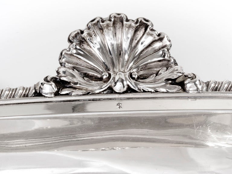 Paul Storr sterling covered entree.
Paul Storr (Westminster 1771 - Tooting 1844) A George III silver entree dish, London 1823 length: Engraved with a coat-of-arms to the upper rim. Artist description: Son of Thomas Storr of Westminster, first