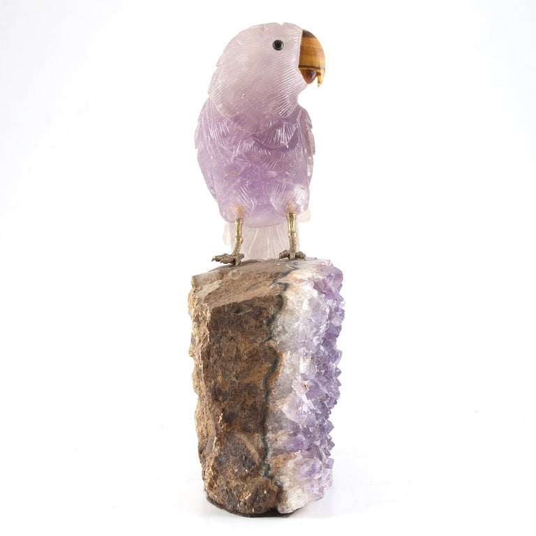 20th Century Amethyst carved parrot with silver claws and tiger's-eye beak.