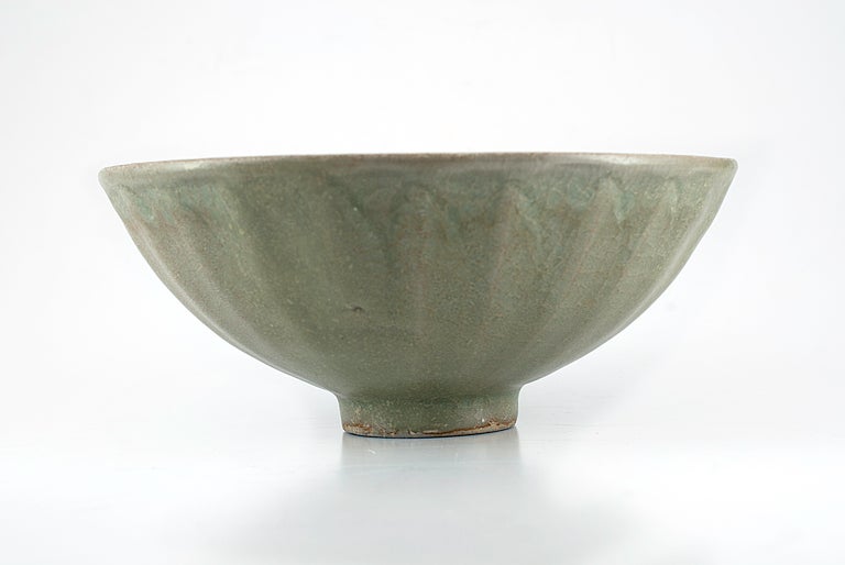 Chinese Song Dynasty Celaon bowl with Lotus leaf detail.
960 and 1279