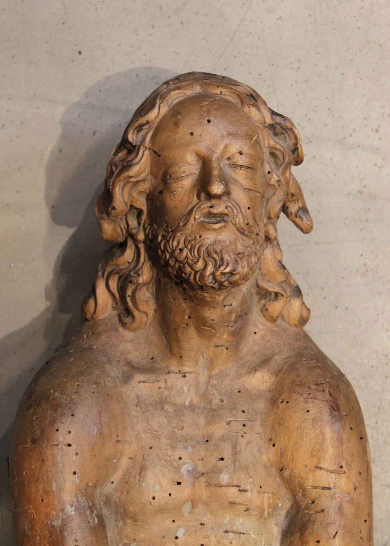 17th century medieval limewood carving of Christ. Likely a model of dead Christ after imagery discovered in the Turin Shroud. Beautifully carved and well-preserved with minor losses constant with age. 

Measures: 29