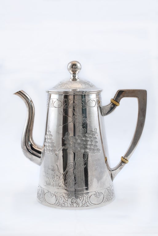 Elegant Chinese export coffee-pot with engraved decoration.
