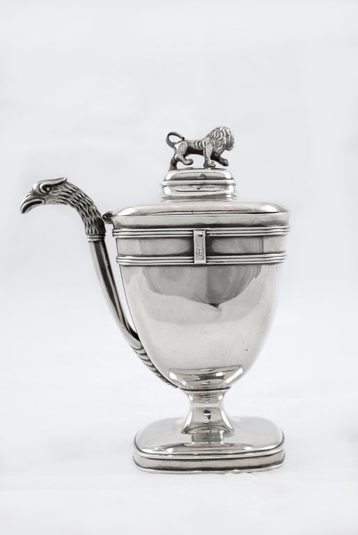 Unusual 'mustard' pot with lion finial and phoenix handle.