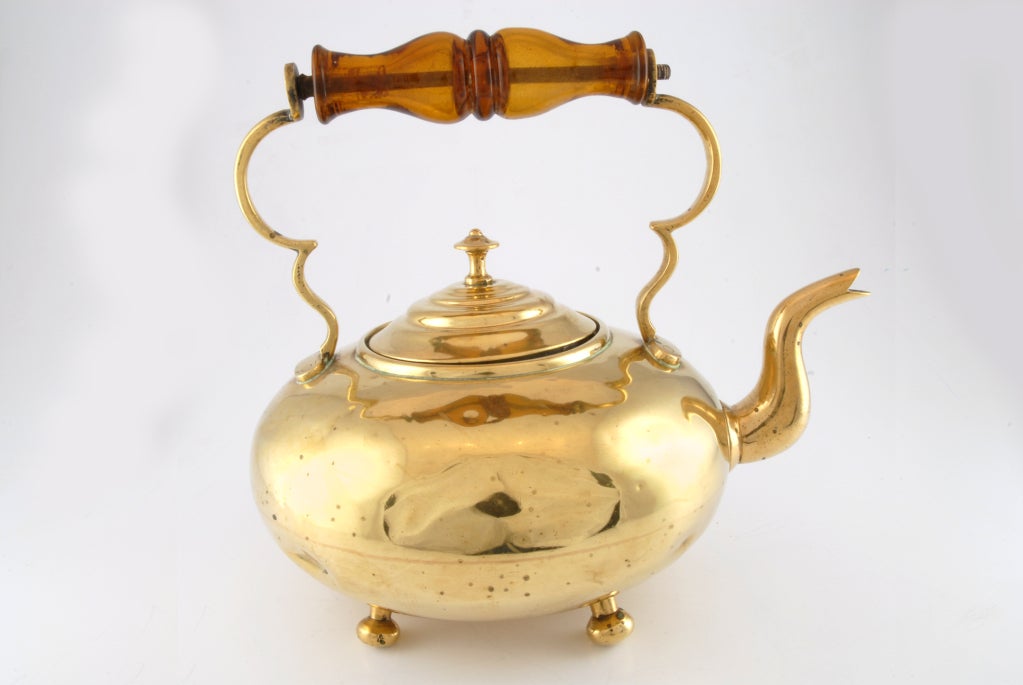 Antique Brass tea-kettle with glass handle.