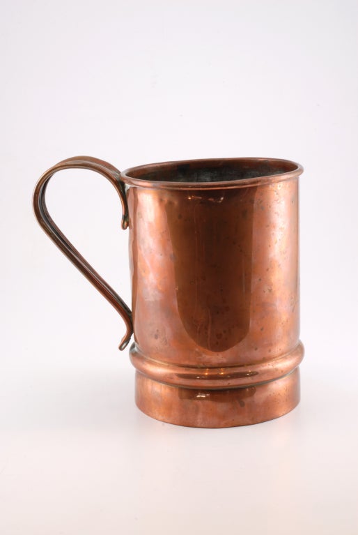 Handsome early copper mug. Wonderful holder for tulips!